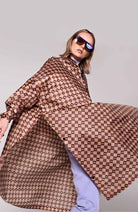Rainkiss Unisex Damier poncho made of sustainable recycled PET | Sophie Stone