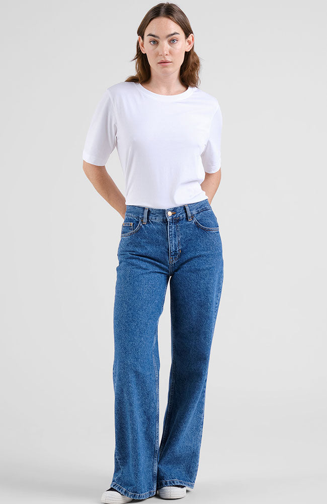 Dedicated Berlin flare jeans mid blue in recycled cotton for women | Sophie Stone
