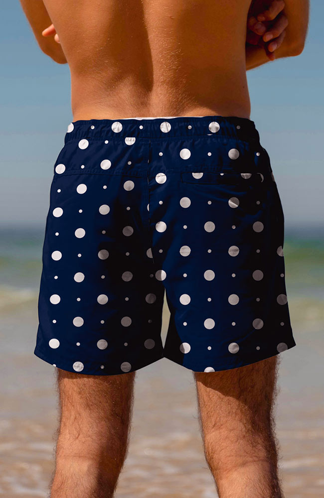 Arlo swimming trunks in dark blue with white dots | Sophie Stone