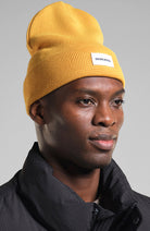 Dedicated Kiruna beanie muts spice yellow | Sophie Stone