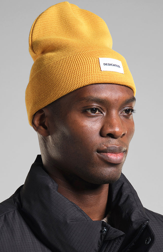 Dedicated Kiruna beanie hat spice yellow | Sophie Stone