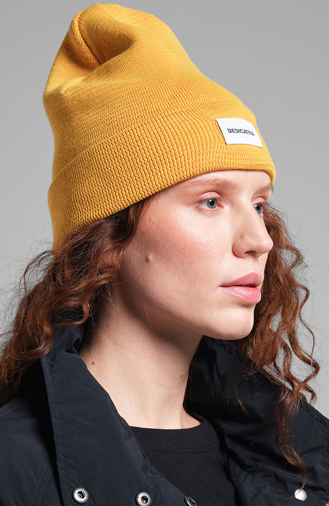 Dedicated Kiruna beanie hat spice yellow recycled | Sophie Stone