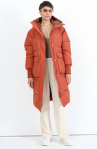 Embassy of Brick and Logs Ry puffer parka burt red gerecycled polyester | Sophie Stone 