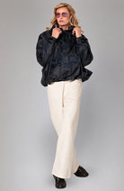 Rainkiss Back to black Anorak regenponcho van GRS gerecycled PET dames | Sophie Stone