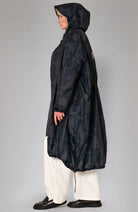Rainkiss Back to black raincoat made of recycled PET unisex | Sophie Stone