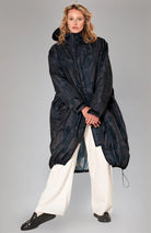 Rainkiss Back to black raincoat made of recycled PET unisex | Sophie Stone