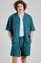Dedicated Sibbarp green shorts made of 100% linen for men | Sophie Stone