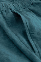 Dedicated Sibbarp shorts in green, made from 100% linen, for men | Sophie Stone