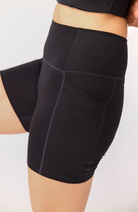 Girlfriend Collective Compressive high-rise run shorts black RPET women | Sophie Stone