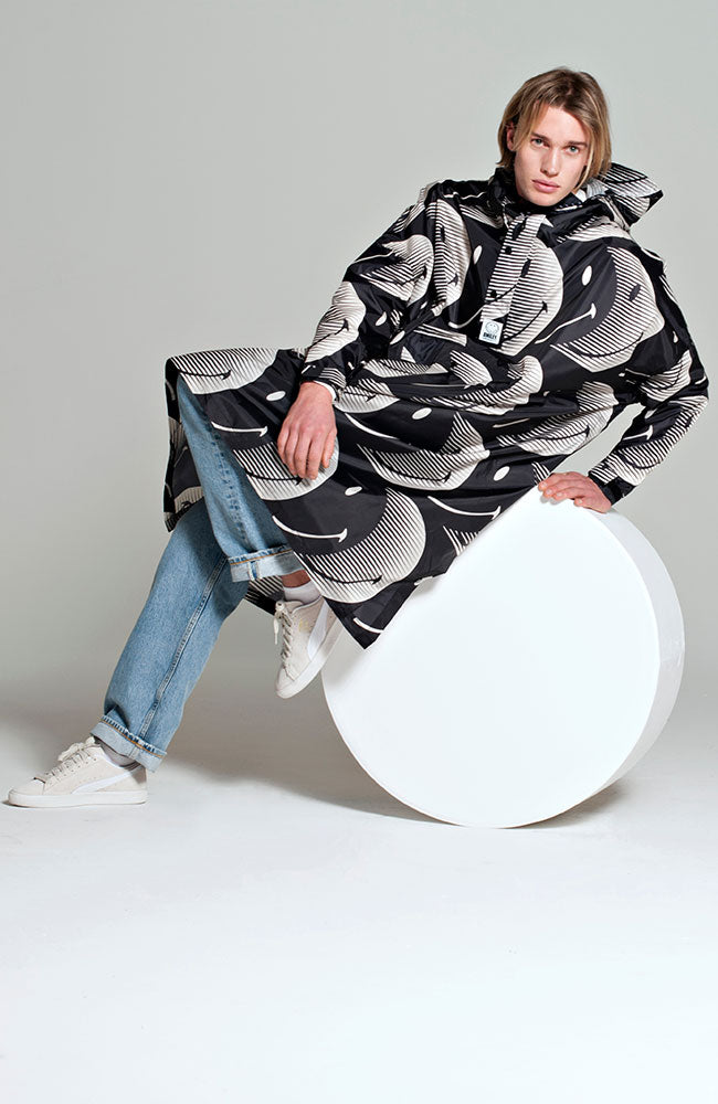 Rainkiss half moon smiley rain poncho made of recycled PET unisex