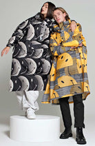 Rainkiss unisex half moon smiley rain poncho made from sustainable recycled PET | Sophie Stone