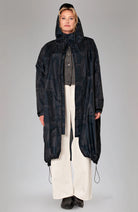 Rainkiss Back to black raincoat made of recycled PET unisex | Sophie Stone