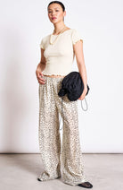 JAN–JUNE Origan women's organic cotton pants with Dalmatian dots | Sophie Stone 