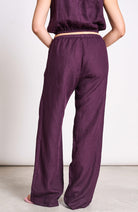 JAN–JUNE Fun cherry-colored lacquered linen pants for women | Sophie Stone 