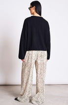 JAN–JUNE Origan women's pants with Dalmatian dots, made from organic cotton | Sophie Stone 