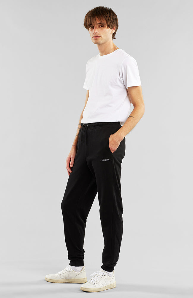 Dedicated Sweatpants lund logo zwart van bio katoen | Sophie Stone