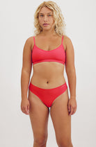 Organic Basics Naked rib hipster strawberry from recycled nylon | Sophie Stone