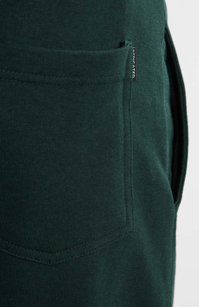 Dedicated Sweatpants lund logo dark green van brushed biologisch katoen | Sophie Stone