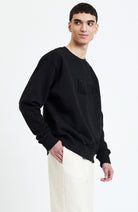 NEW OPTIMIST Olmo sweater black in organic cotton | Sophie Stone